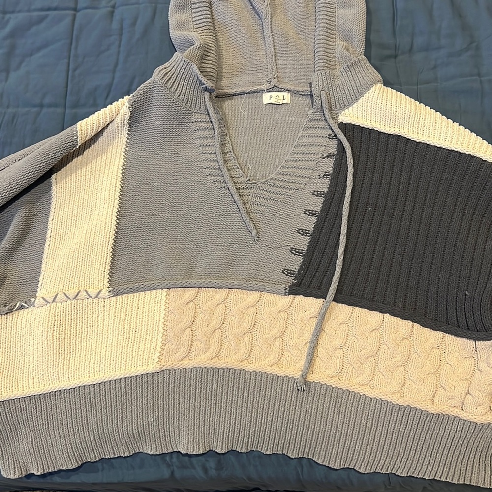 Patched sweater